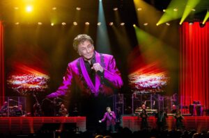 Kansas City, Missouri: BARRY MANILOW performs on stage at the T-Mobile Center during a stop in Kansas City as part of The Last Concerts Tour. Barry Manilow Performs in Kansas City, Missouri, USA - 26 Aug 2024