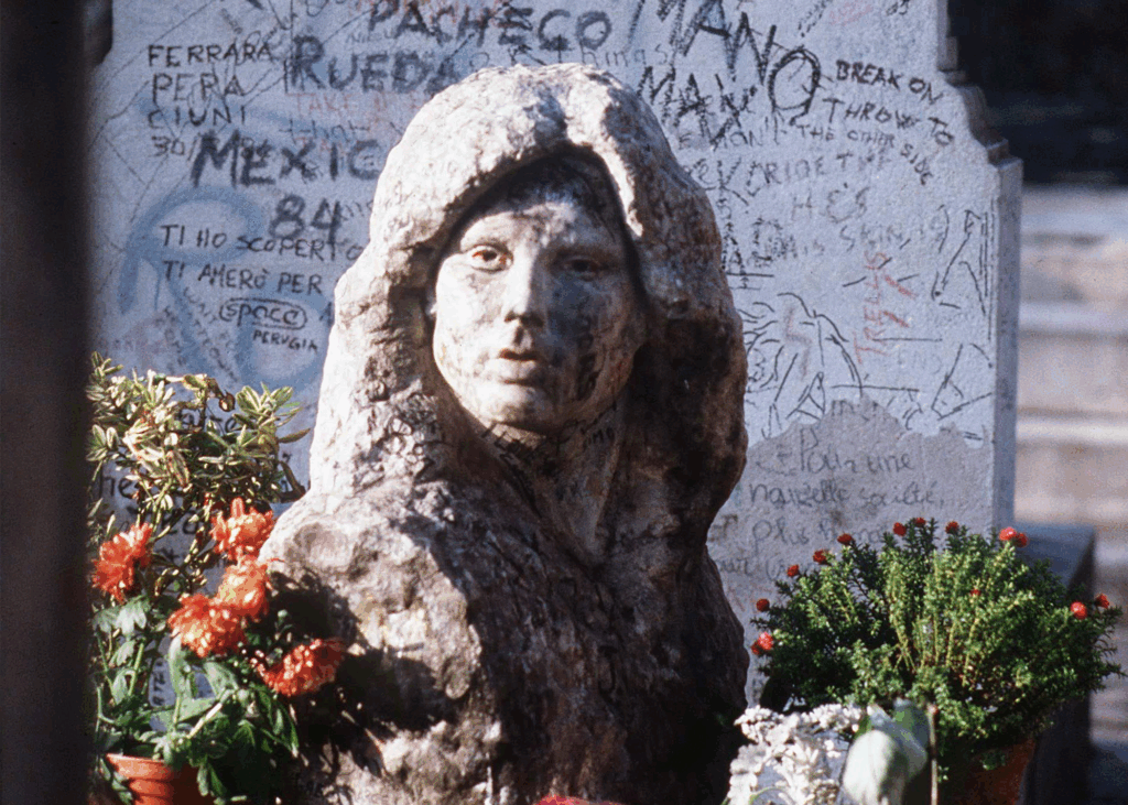 JIM MORRISON'S GRAVE , PERE LACHAISE CEMETERY, PARIS, FRANCE - 1994 THE GRAVE OF JIM MORRISON JIM MORRISON'S GRAVE , PERE LACHAISE CEMETERY, PARIS, FRANCE - 1994