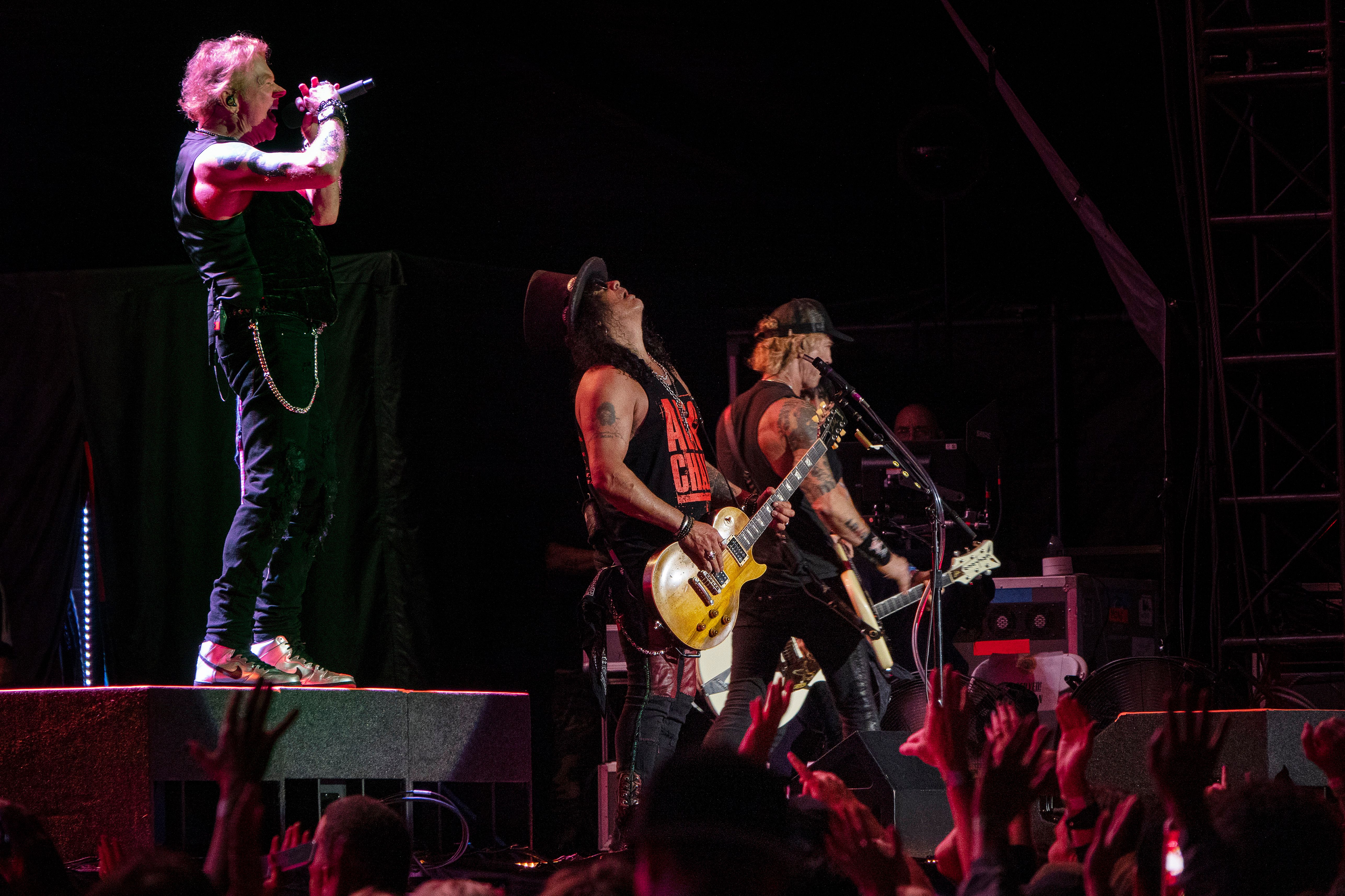Axl Rose, left, guitarist Slash and bassist Duff McKagan of the rock band Guns N' Roses perform live onstage at Snapdragon Stadium in San Diego. Guns N' Roses Concert, San Diego, California, USA - 01 Oct 2023