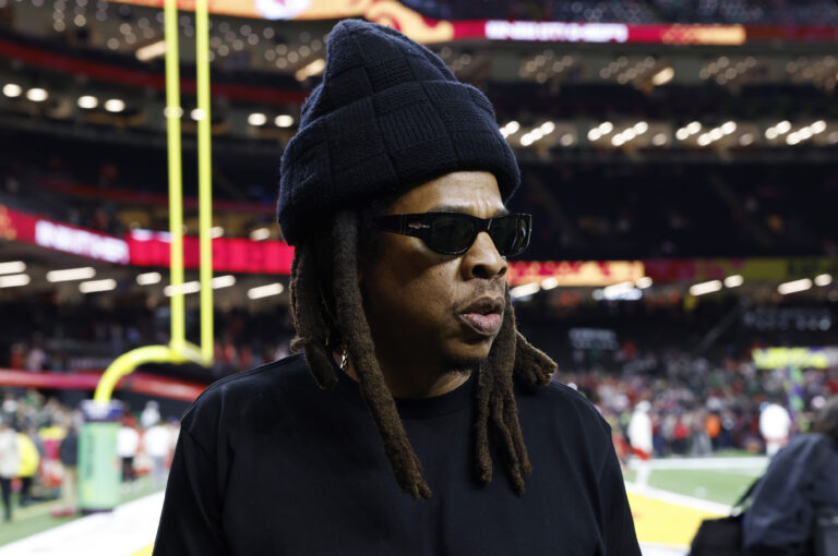 Entertainer Jay-Z stands on the sideline with daughters Blue Ivy (L) and Rumi before the Philadelphia Eagles defeat the Kansas City Chiefs 40-22 in Super Bowl LIX at Caesars Superdome in New Orleans on Sunday, February 9, 2025. Super Bowl Lix, New Orleans, Louisiana, United States - 09 Feb 2025