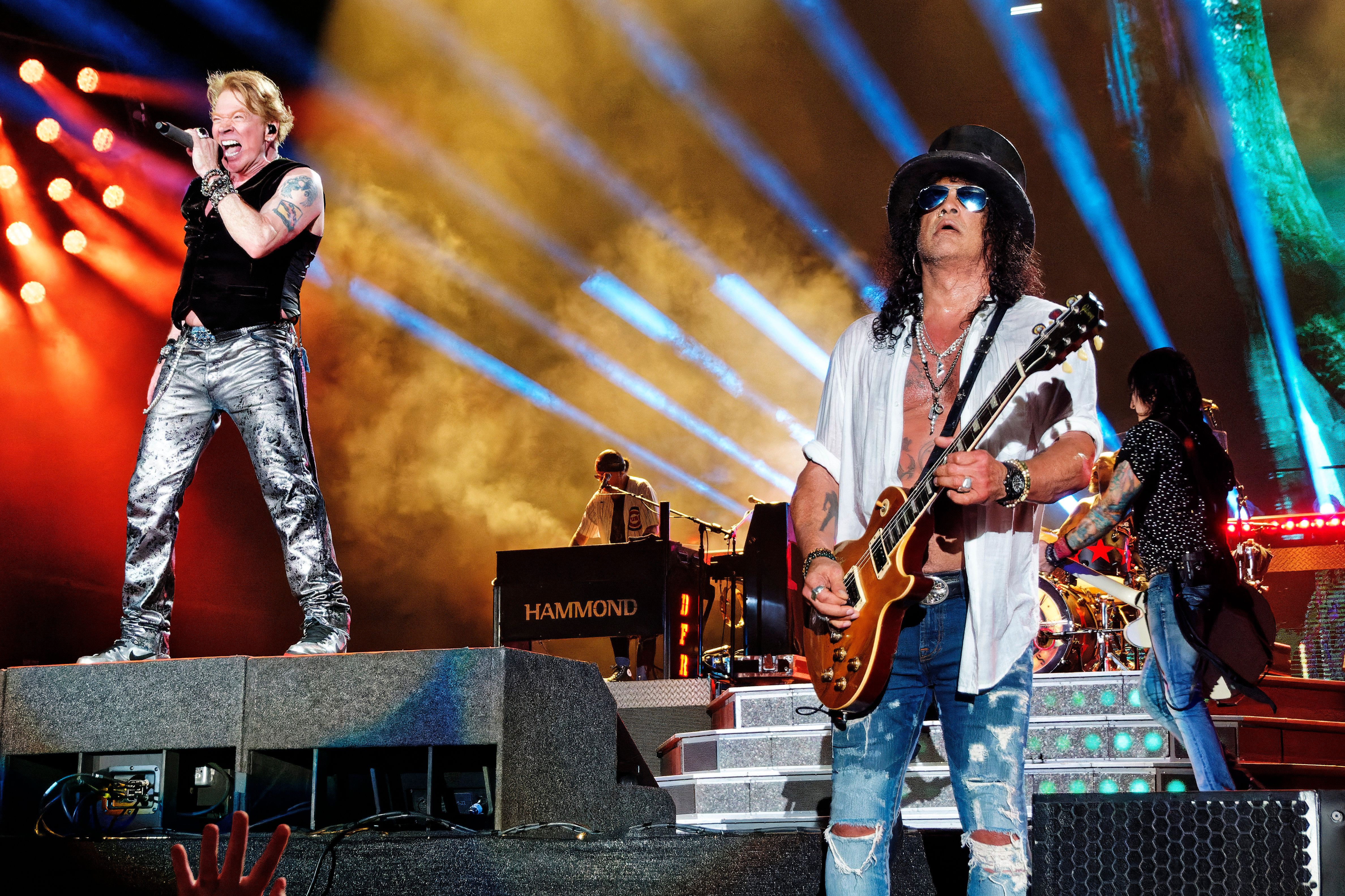 Axl Rose, left, and Slash, of Guns N' Roses, perform on Thursday, Aug. 24, 2023, at Wrigley Field in Chicago. Guns N' Roses in concert at Wrigley Field in Chicago, Illinois, USA - 24 Aug 2023