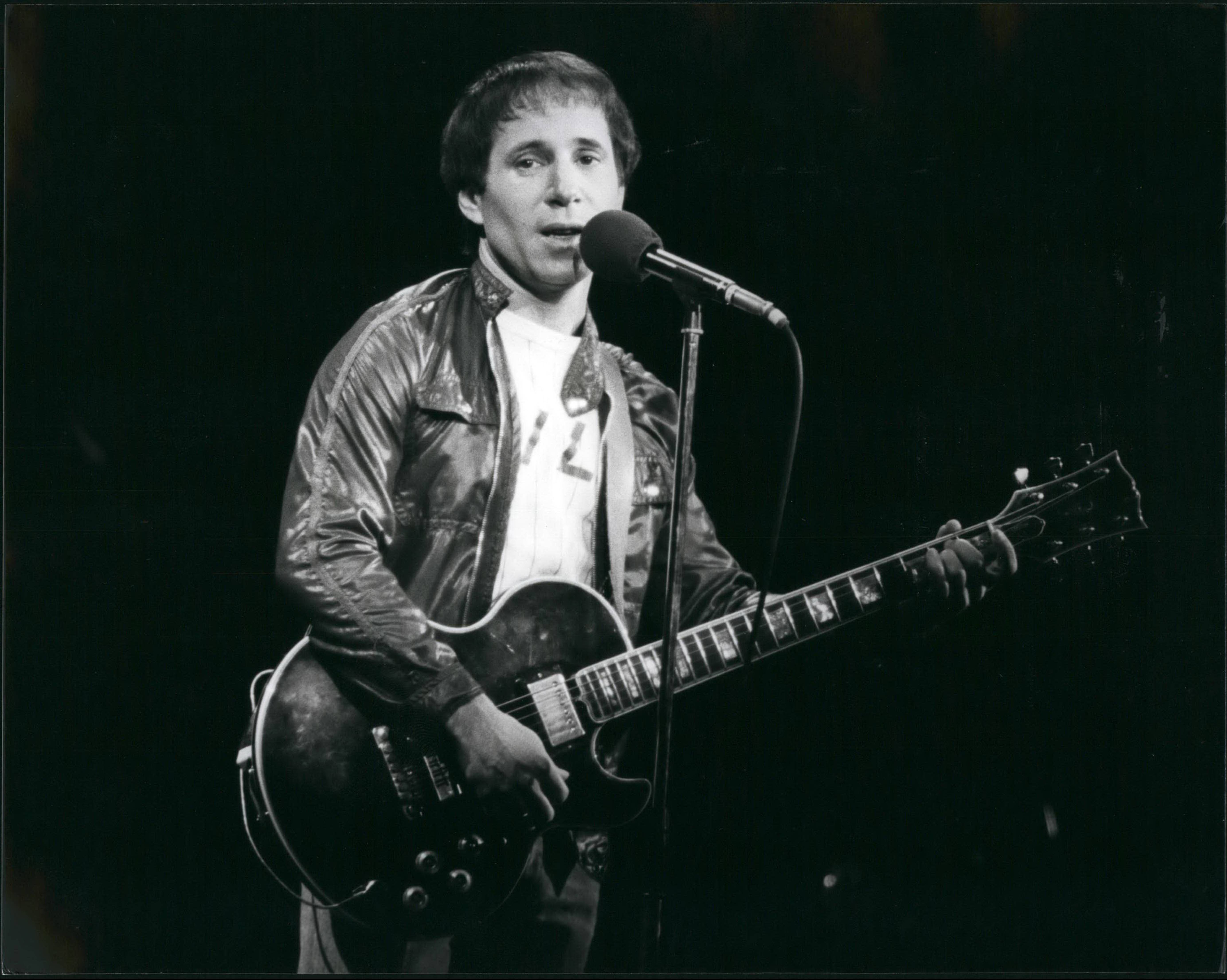 Paul Simon in concert in London Various Ten years after splitting from his singing partner Art Garfunkel, American singing star Paul Simon is still an international bestseller. A multi-millionaire who has sold 40 million records in the past 20 years, he has been in London recently to give a series of solo concerts, backed by a band and chorus, For the past four years he has been involved in a film, ''One Trick Pony'' which he wrote and starred in and has now been released in the States. Paul now lives with actress Carrie Fisher, of ''Star Wars'' fame, whilst his eight year old son Marper lives nearby in New York with Pauls ex-wife Peggy.