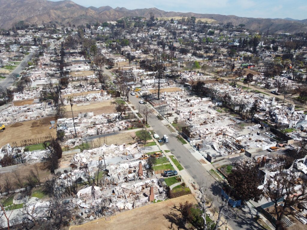 Reconstruction of Palisades fire in Pacific Palisades, California, USA - 22 Mar 2025 Mandatory Credit: Photo by Michael Ho Wai Lee/SOPA Images/Shutterstock (15218007b)
The aerial view of the burnt houses that left ash behind at Pacific Palisades.(Editor's note: Image taken by drone.) Pacific Palisades was one of the cities most severely affected by the Palisades wildfire in January 2025, with thousands of houses and businesses consumed by flames and leaving only ash behind, displacing many residents and devastating the community. Two months later, reconstruction efforts are in full swing as workers clear away ash and burnt materials in the first phase of rebuilding, while simultaneously working to restore essential utilities and help residents reclaim their homes and livelihoods as quickly as possible.
Reconstruction of Palisades fire in Pacific Palisades, California, USA - 22 Mar 2025