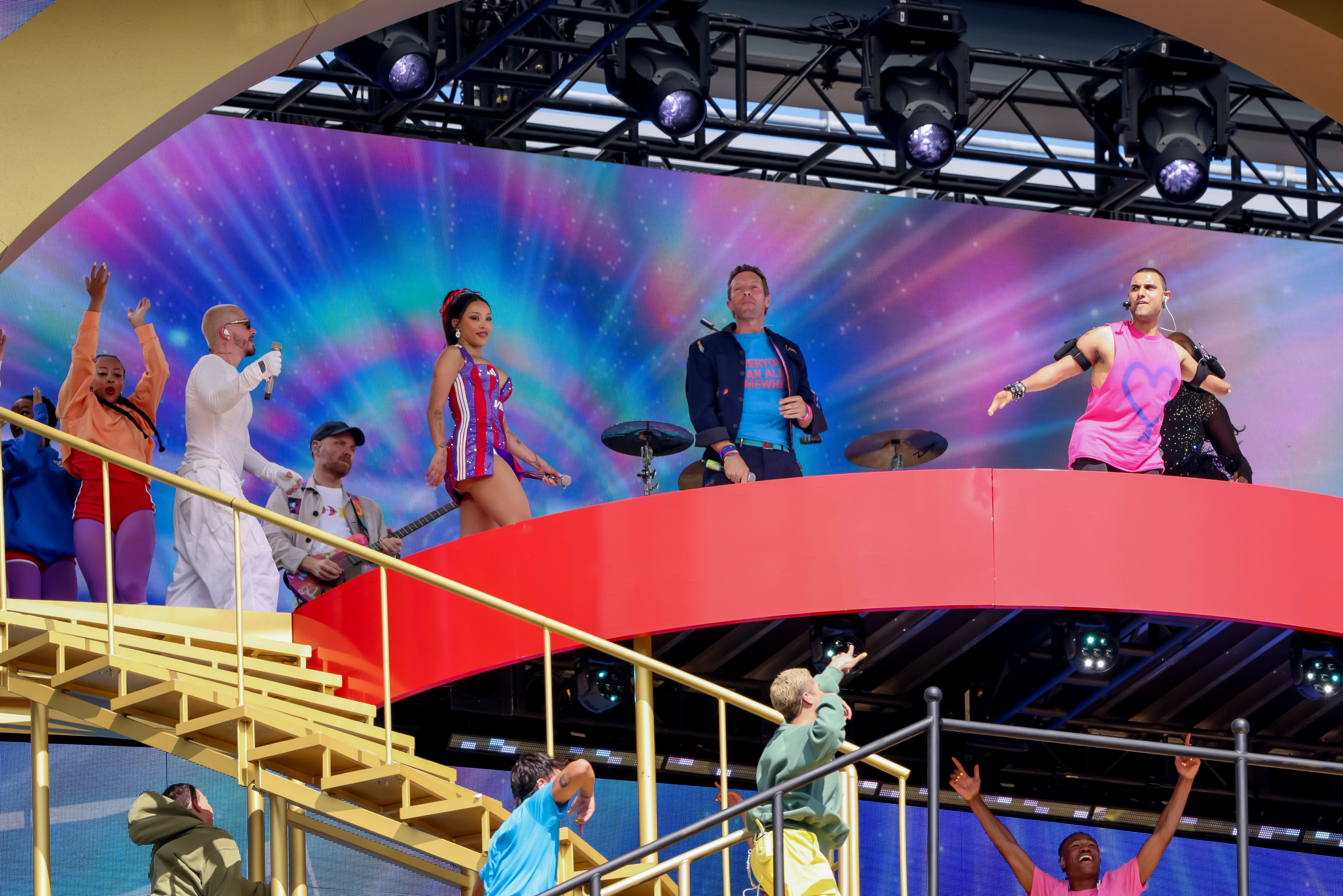 Singer Emmanuel Kelly (R), English singer Chris Martin (C) of Coldplay, US singer Doja Cat (C-L), Colombian singer J Balvin (2-L), and Nigerian singer Tems (L) perform during the halftime show of the FIFA Club World Cup 2025 Final match between Chelsea FC and Paris Saint-Germain, in East Rutherford, New Jersey, USA, 13 July 2025. FIFA Club World Cup 2025 Final - Chelsea vs PSG, East Rutherford, USA - 13 Jul 2025