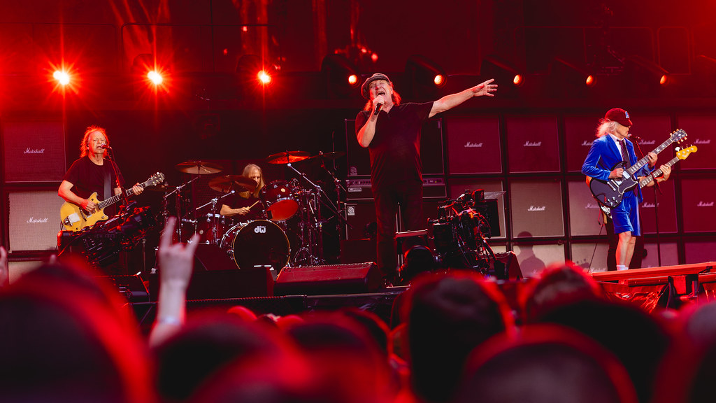 Stevie Young of AC/DC live performance photo.
