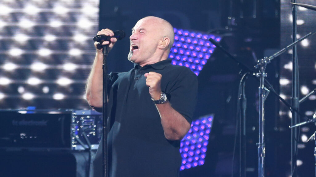 Phil Collins performing live at the 2016 US Open in New York.