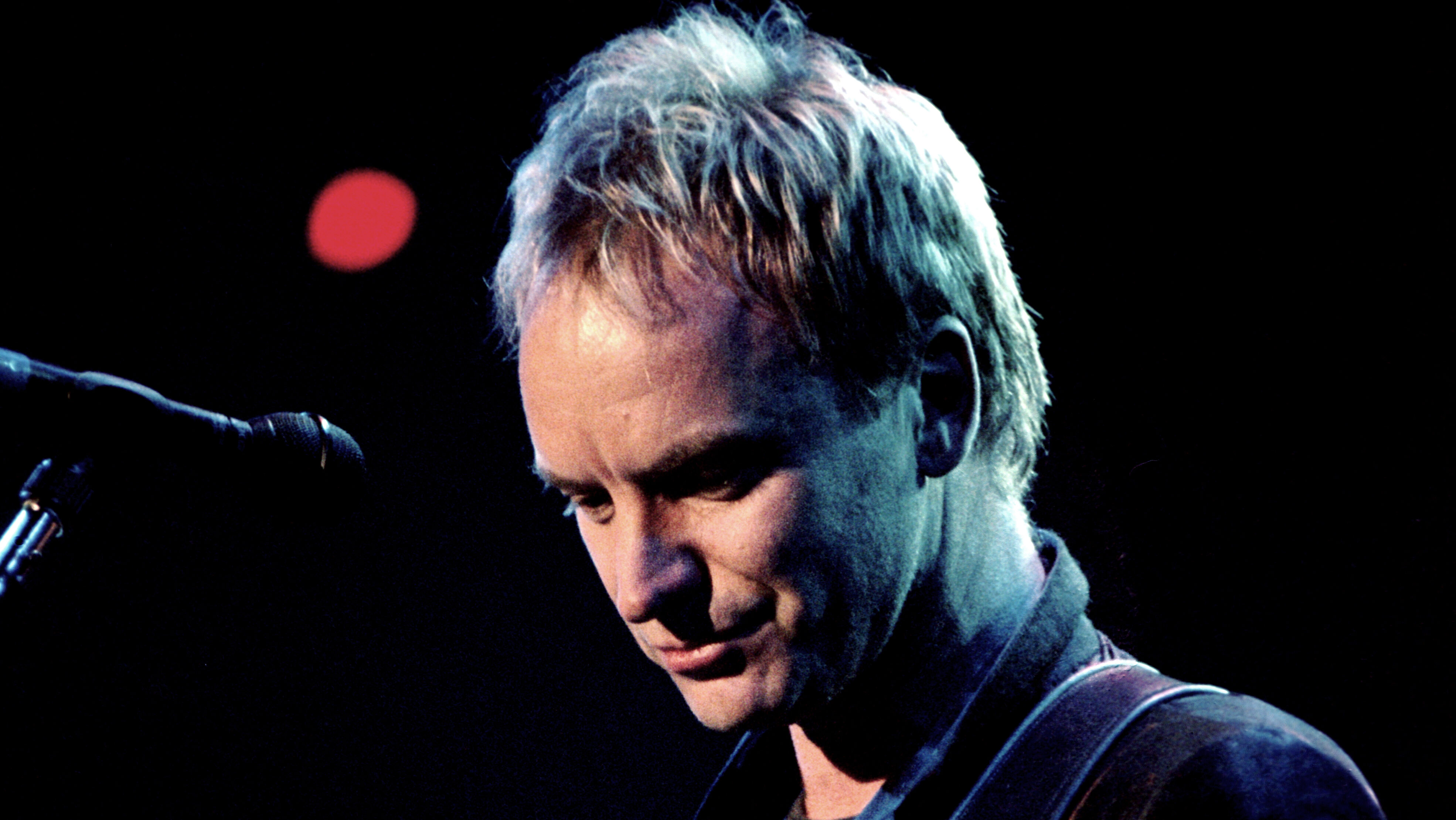 Sting performing live in concert