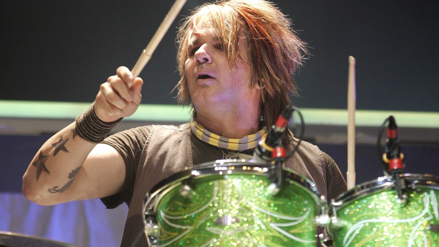 Poison performs in concert